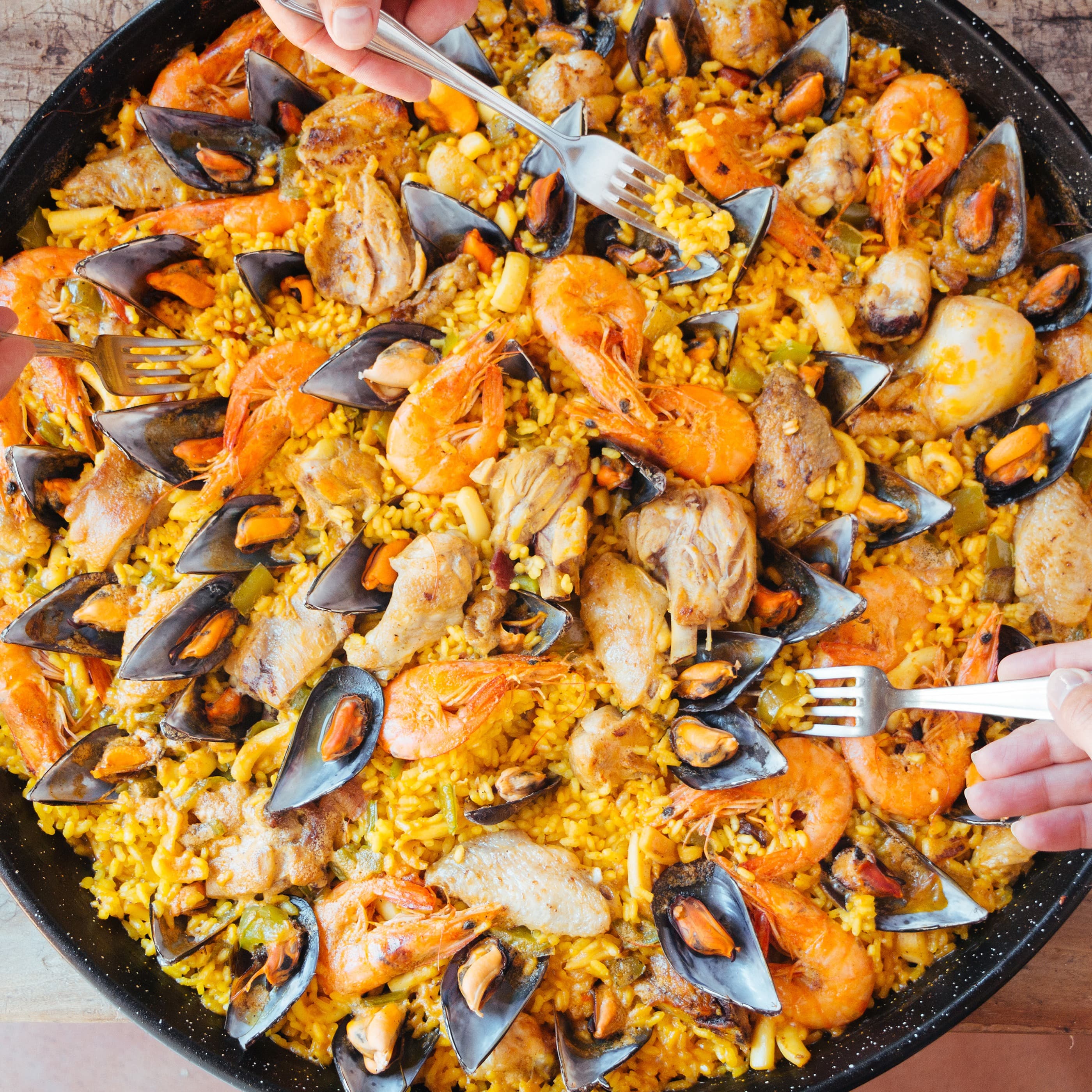 Mixed seafood classic Spanish paella. Mussels, prawns and squid